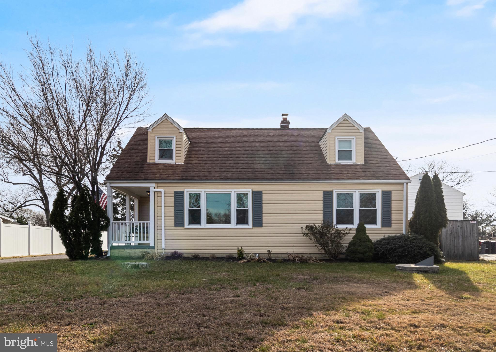 6905 East Clinton Street Clinton, MD 20735 - Photo 46 of 47 a view of a house with a yard