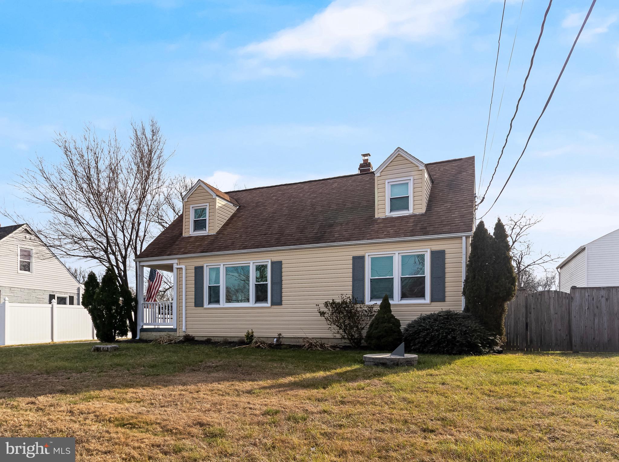 6905 East Clinton Street Clinton, MD 20735 - Photo 47 of 47 a front view of a house with a yard