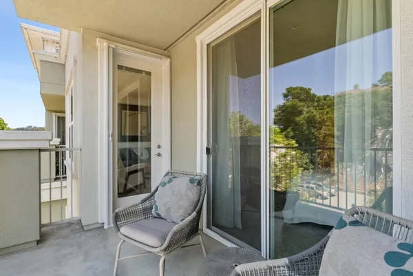 a view of balcony with patio