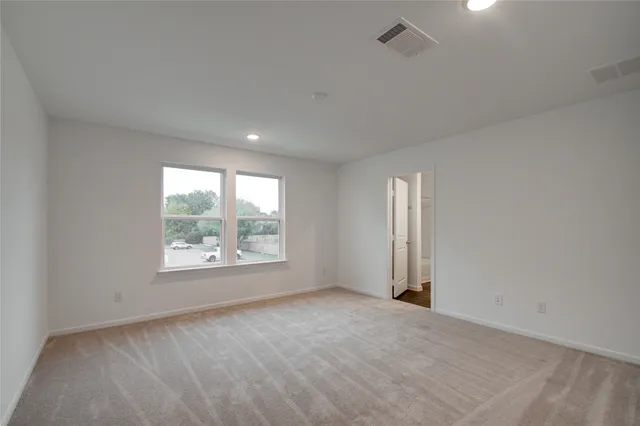 an empty room with windows