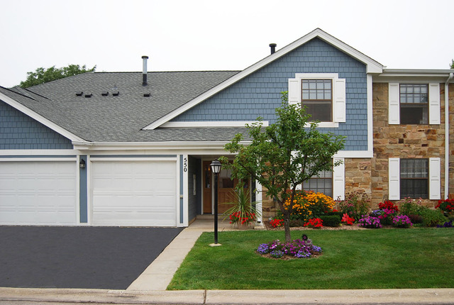 a house view with a garden space