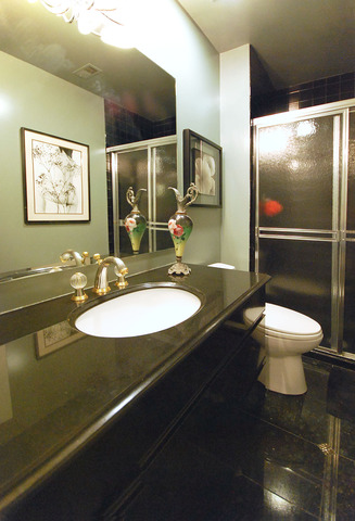 550 Greystone Lane, Unit A2 Wheeling, IL 60090 - Photo 11 of 23 a bathroom with a sink a toilet and shower