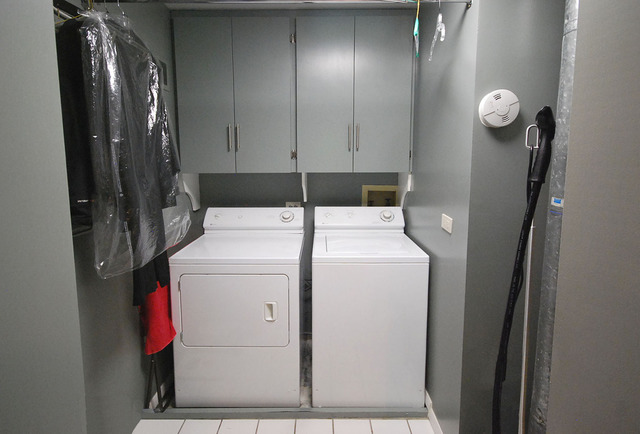 550 Greystone Lane, Unit A2 Wheeling, IL 60090 - Photo 16 of 23 a utility room with dryer and washer