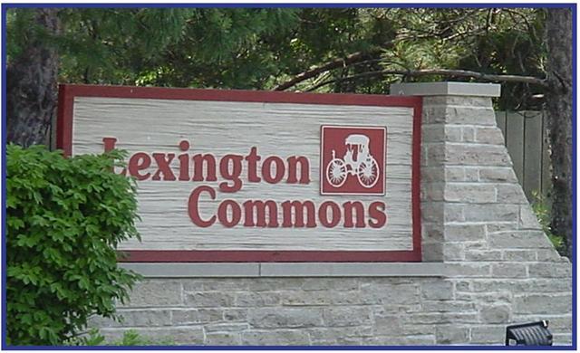 550 Greystone Lane, Unit A2 Wheeling, IL 60090 - Photo 19 of 23 a sign that is on the wall of building