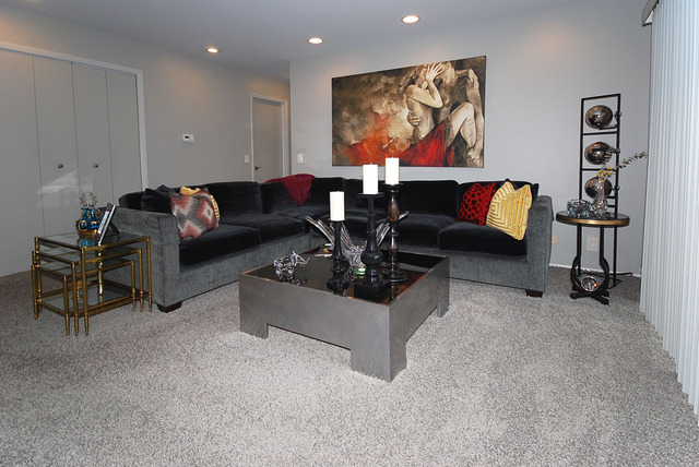 550 Greystone Lane, Unit A2 Wheeling, IL 60090 - Photo 2 of 23 a living room with furniture and wooden floor