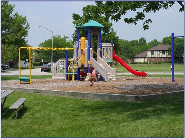 550 Greystone Lane, Unit A2 Wheeling, IL 60090 - Photo 22 of 23 a view of park with slide