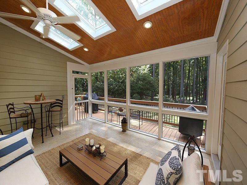 8320 Wheatstone Lane Raleigh, NC 27613 - Photo 19 of 23 Complete with bead board ceiling, skylights and tiled floor & fan. Overlooks the deep, wooded yard.