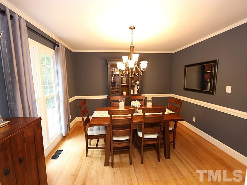 8320 Wheatstone Lane Raleigh, NC 27613 - Photo 5 of 23 Dining Room is perfect and awaiting your next friend or family get together.