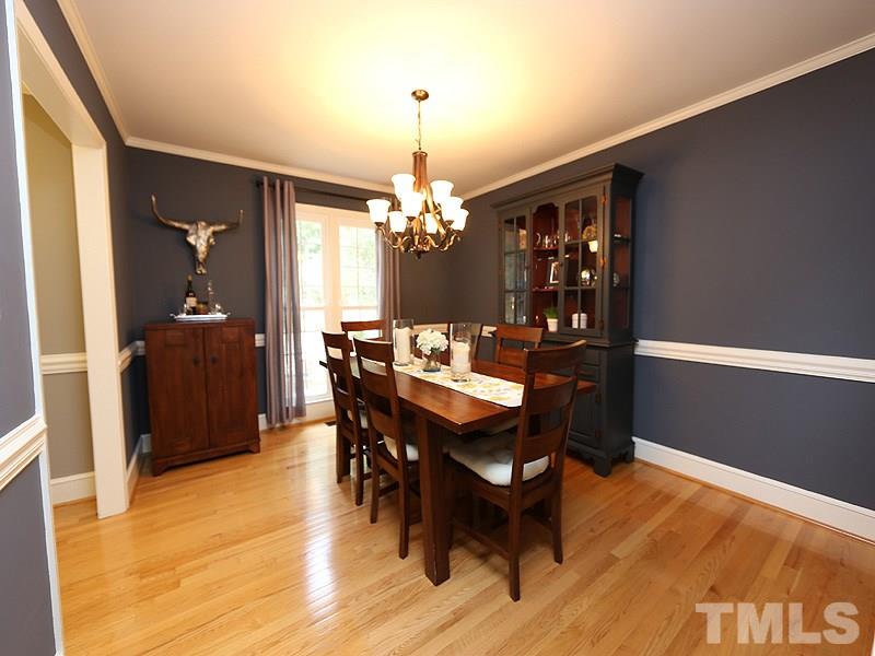 8320 Wheatstone Lane Raleigh, NC 27613 - Photo 6 of 23 Spacious with hardwood floors and open feel.