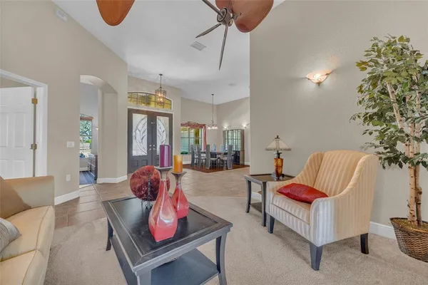 a living room with furniture and a window