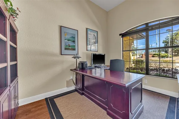a bedroom with furniture and window