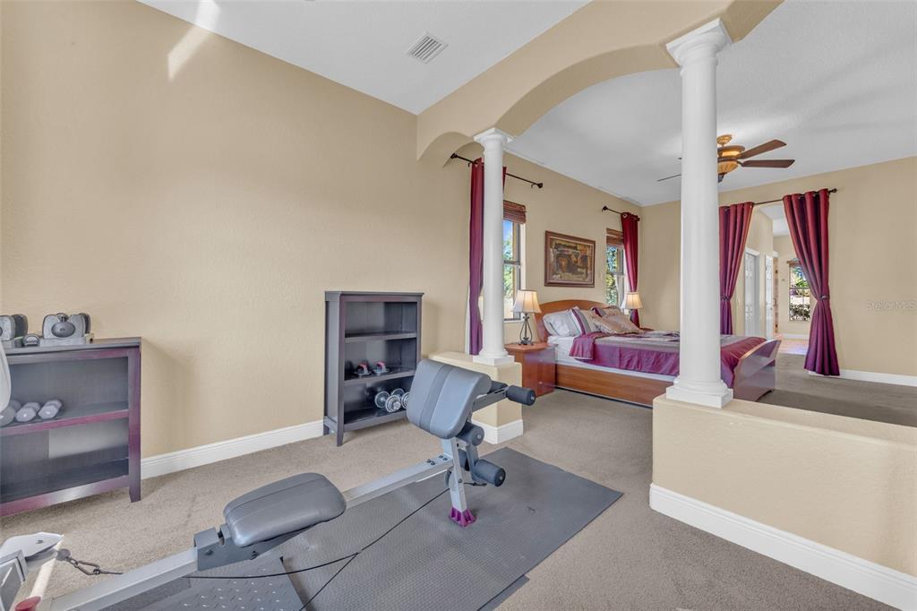 13101 Shadow Run Boulevard Riverview, FL 33569 - Photo 21 of 86 a living room with furniture and a fireplace