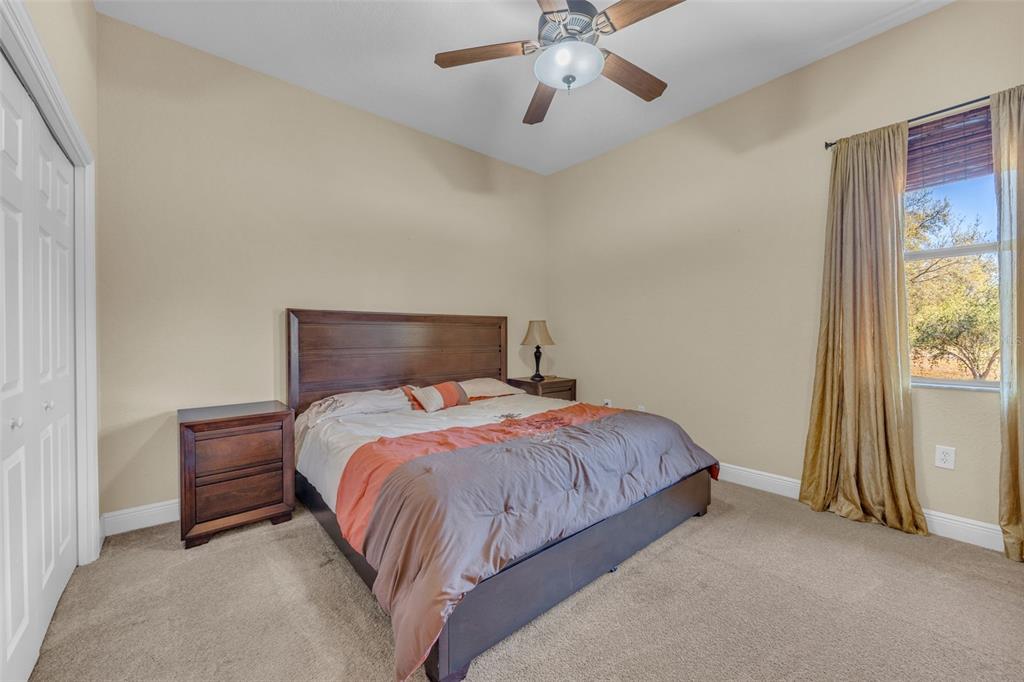 13101 Shadow Run Boulevard Riverview, FL 33569 - Photo 45 of 86 a bedroom with a bed and a window