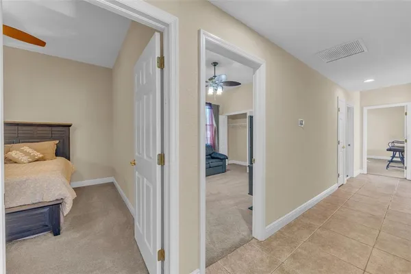 an aerial view of a house with outdoor space and lake view