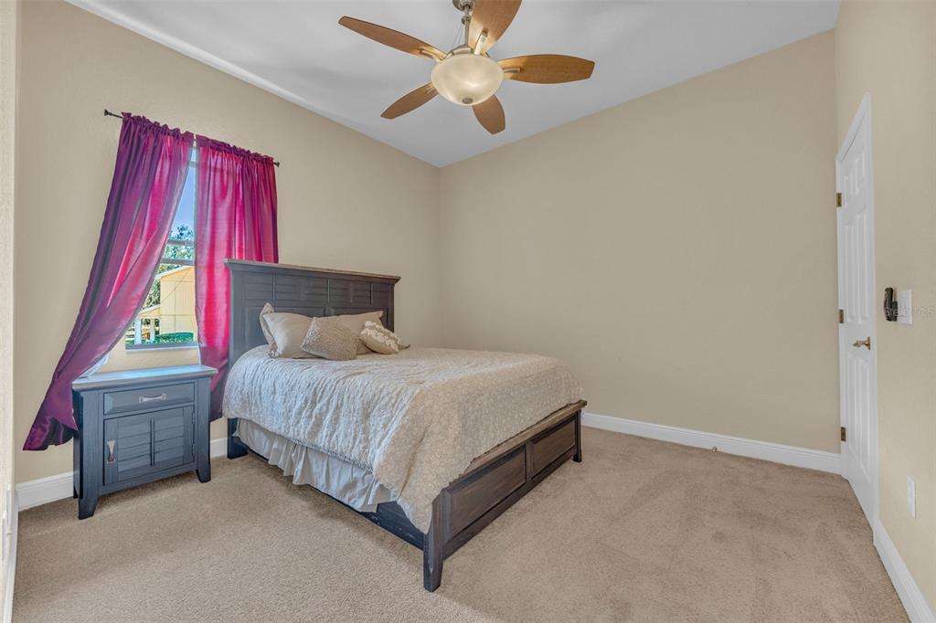 13101 Shadow Run Boulevard Riverview, FL 33569 - Photo 53 of 86 a bedroom with a bed and a window