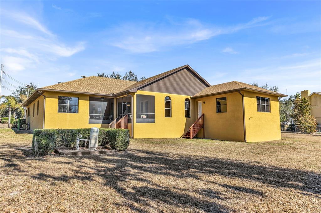 13101 Shadow Run Boulevard Riverview, FL 33569 - Photo 73 of 86 a front view of a house with a yard