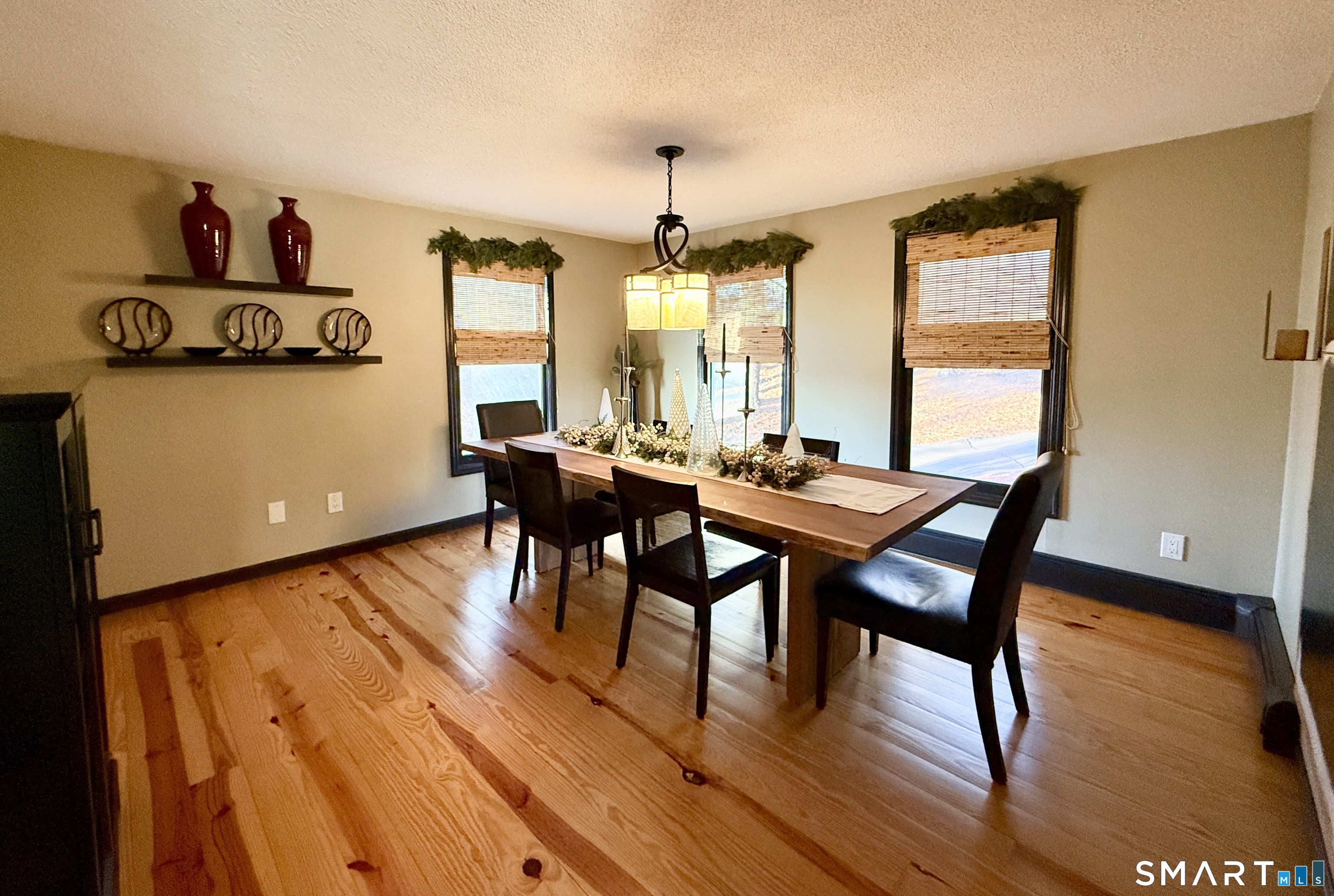 105 Riverside Drive Meriden, CT 06451 - Photo 15 of 27 a view of a dining room with furniture window and wooden floor