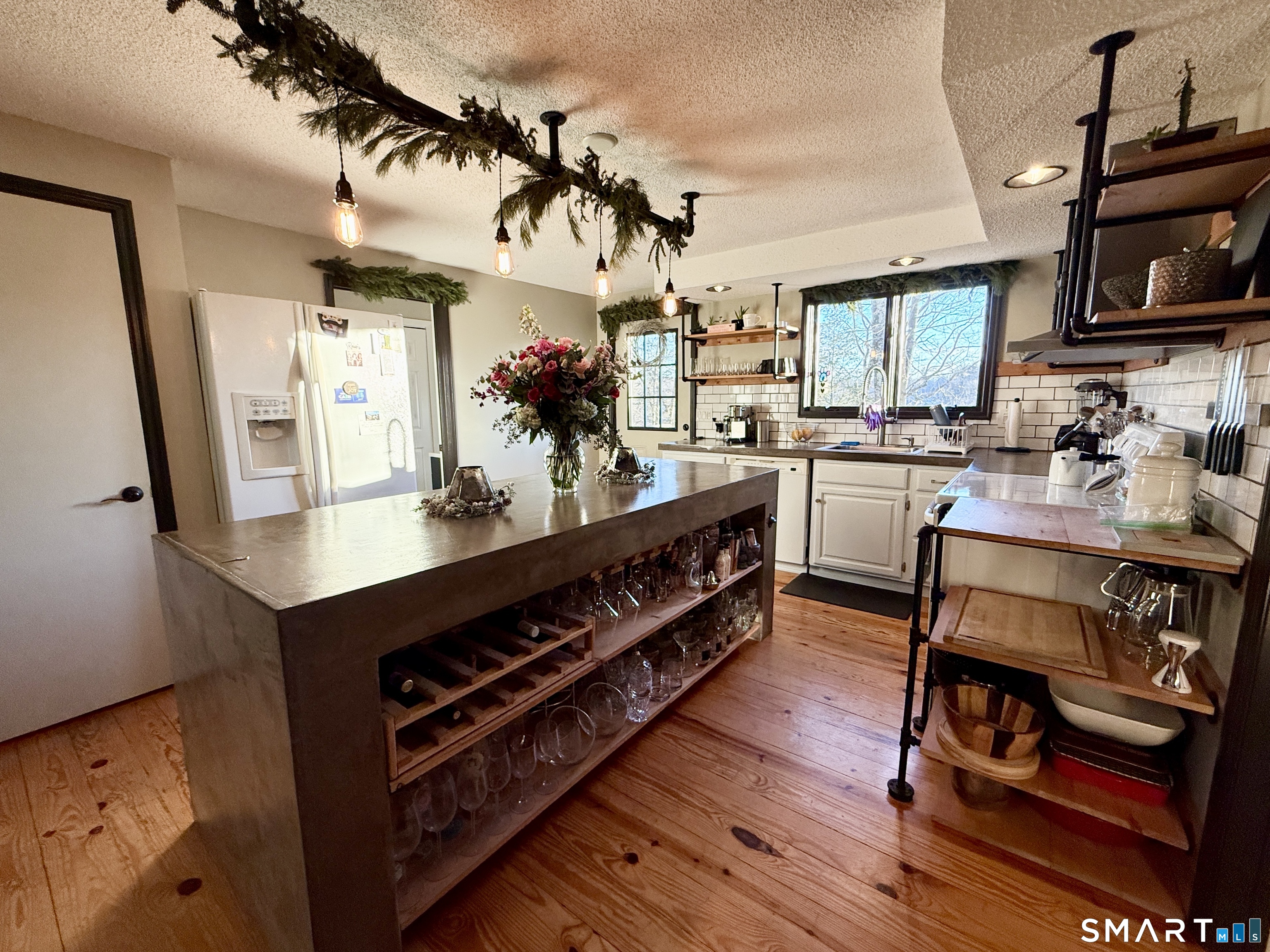 105 Riverside Drive Meriden, CT 06451 - Photo 17 of 27 a open kitchen with stainless steel appliances granite countertop a stove and cabinets