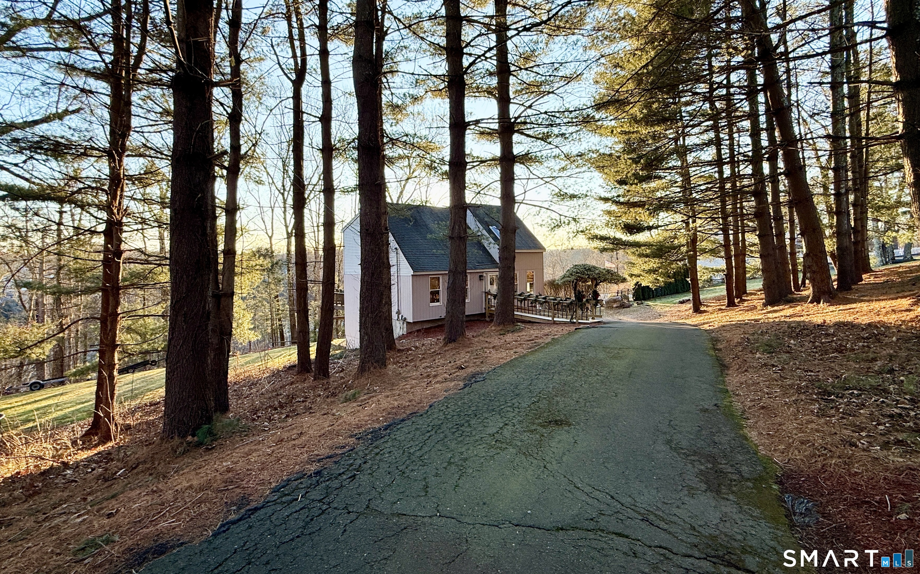 105 Riverside Drive Meriden, CT 06451 - Photo 5 of 27 a view of a park with large trees