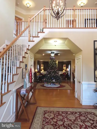 a view of a balcony with a floor to ceiling window