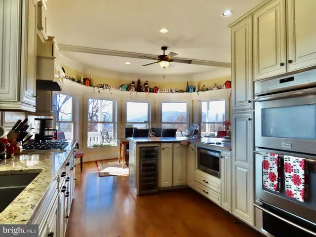 a view of a balcony with a floor to ceiling window