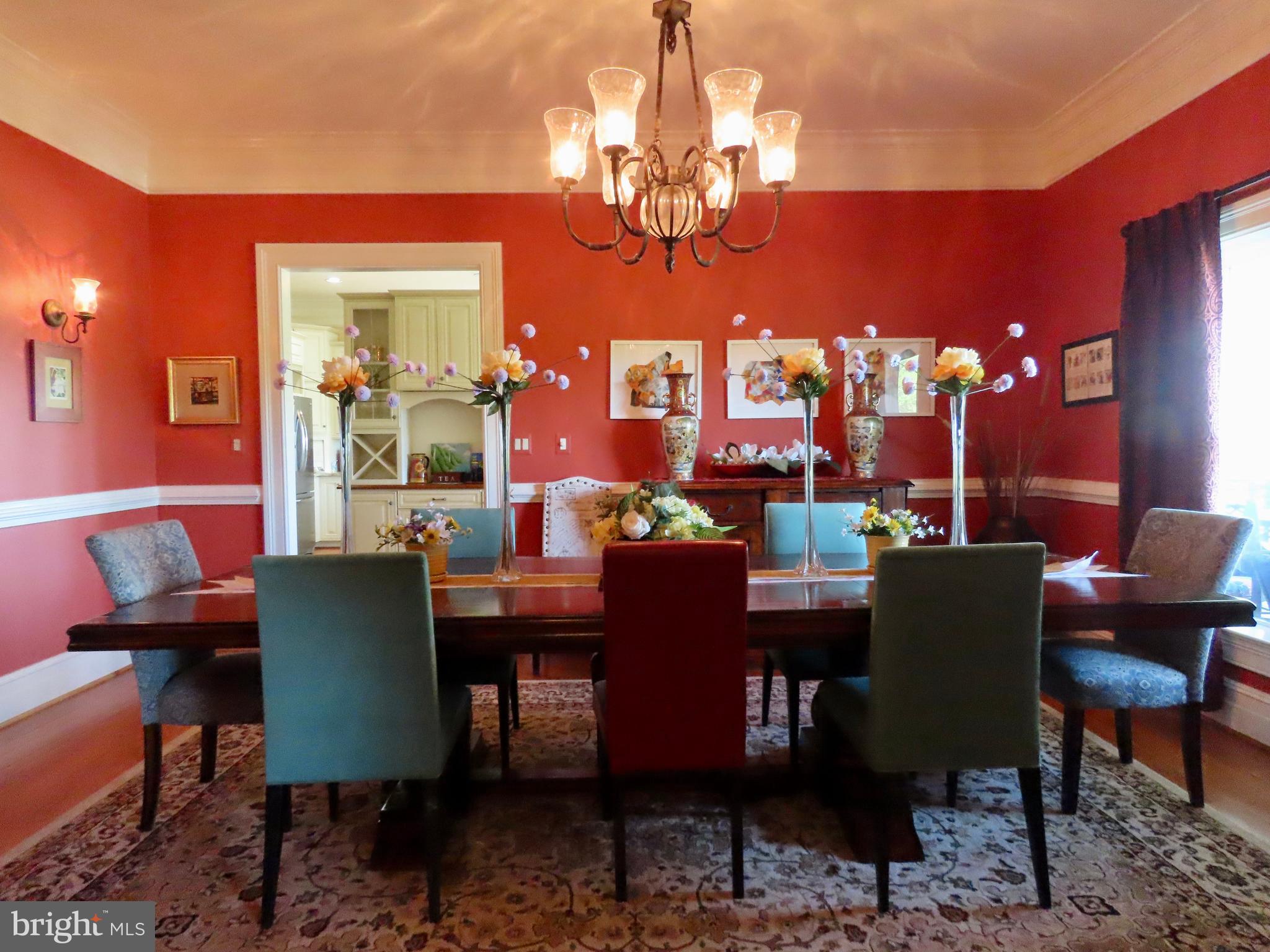 65 Clark Lane Washington, VA 22747 - Photo 16 of 62 a view of a dining room with furniture and chandelier