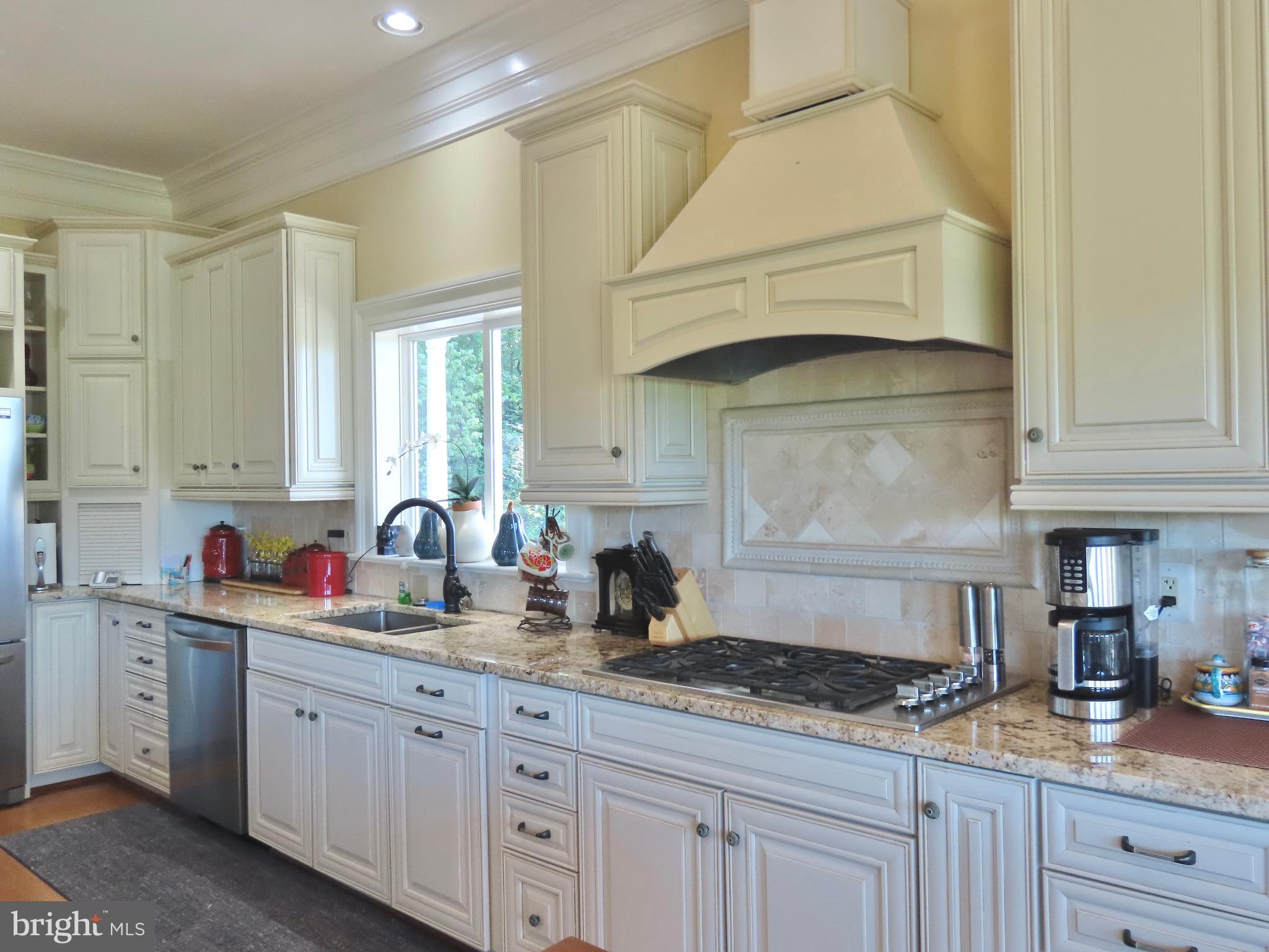 65 Clark Lane Washington, VA 22747 - Photo 18 of 62 a kitchen with stainless steel appliances granite countertop a sink a stove and cabinets