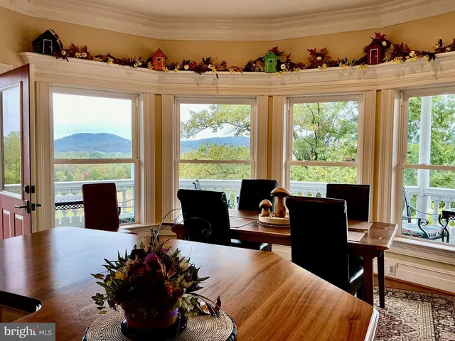 a spacious bathroom with a double vanity sink and a mirror