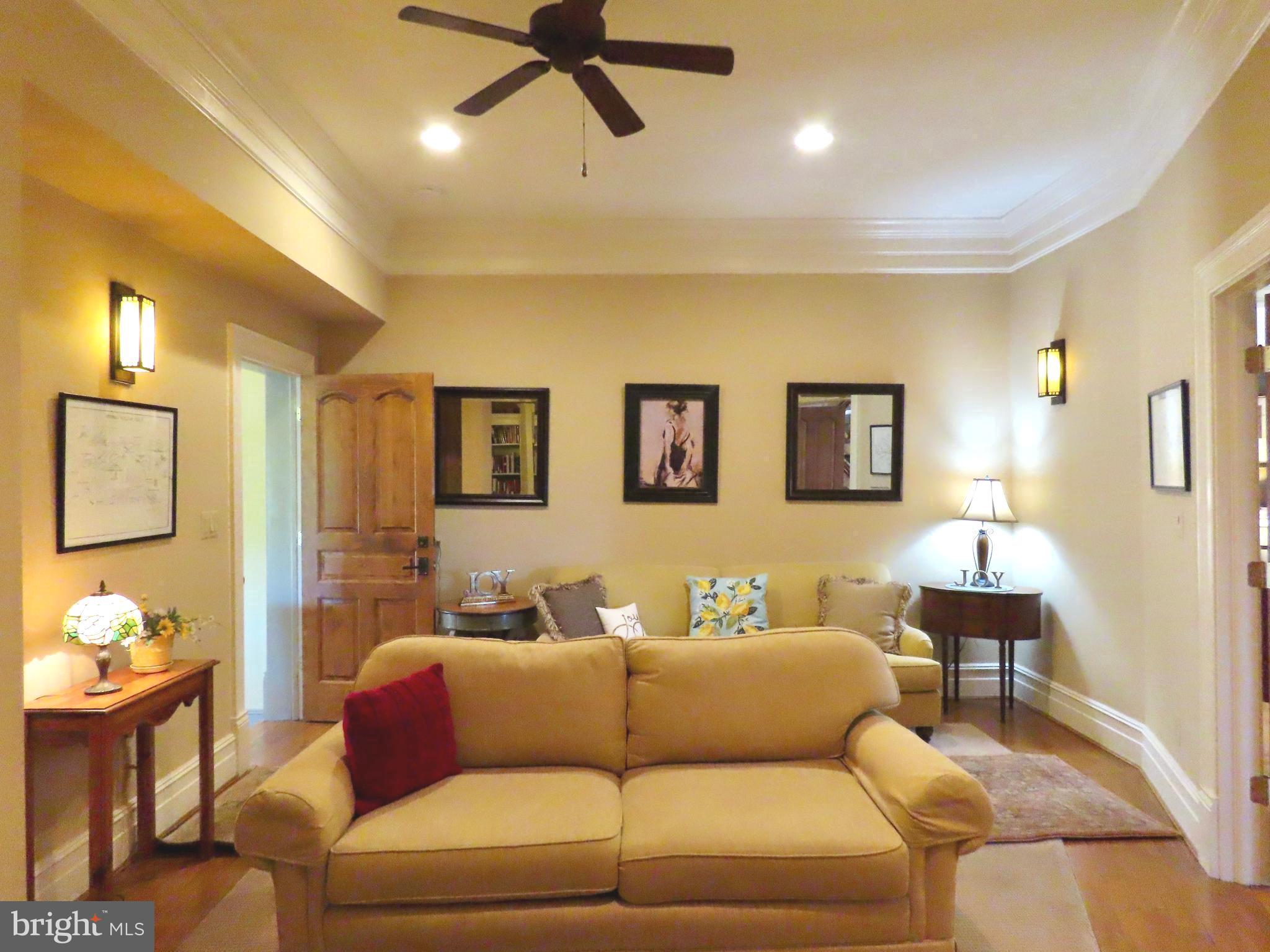 65 Clark Lane Washington, VA 22747 - Photo 21 of 62 a living room with furniture and a wooden floor