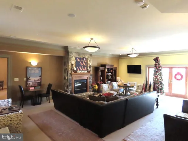 a bedroom with a bed and a lamp