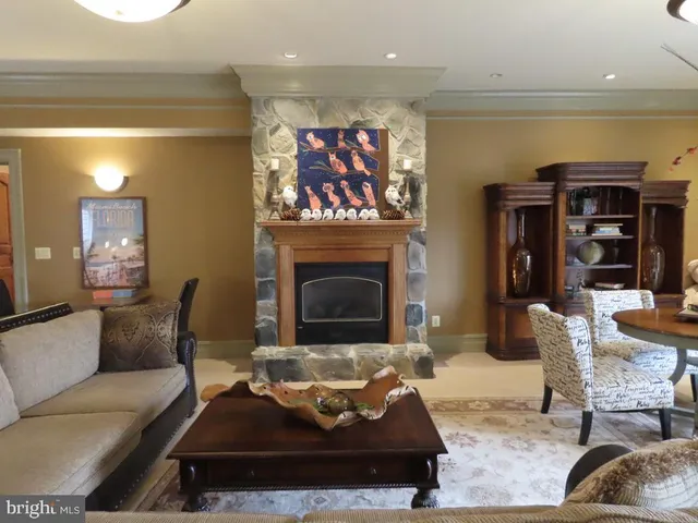 a bathroom with a toilet mirror and vanity