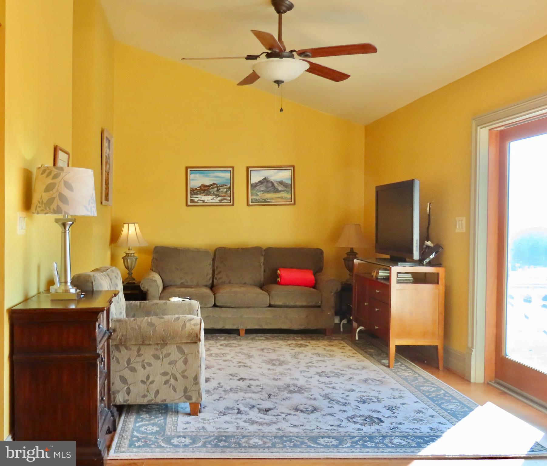 65 Clark Lane Washington, VA 22747 - Photo 28 of 62 a living room with furniture and a flat screen tv