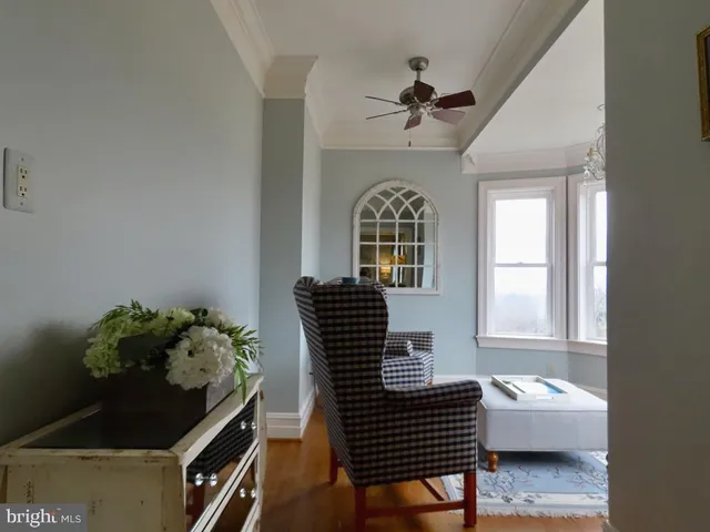 a bedroom with a bed a desk and chair
