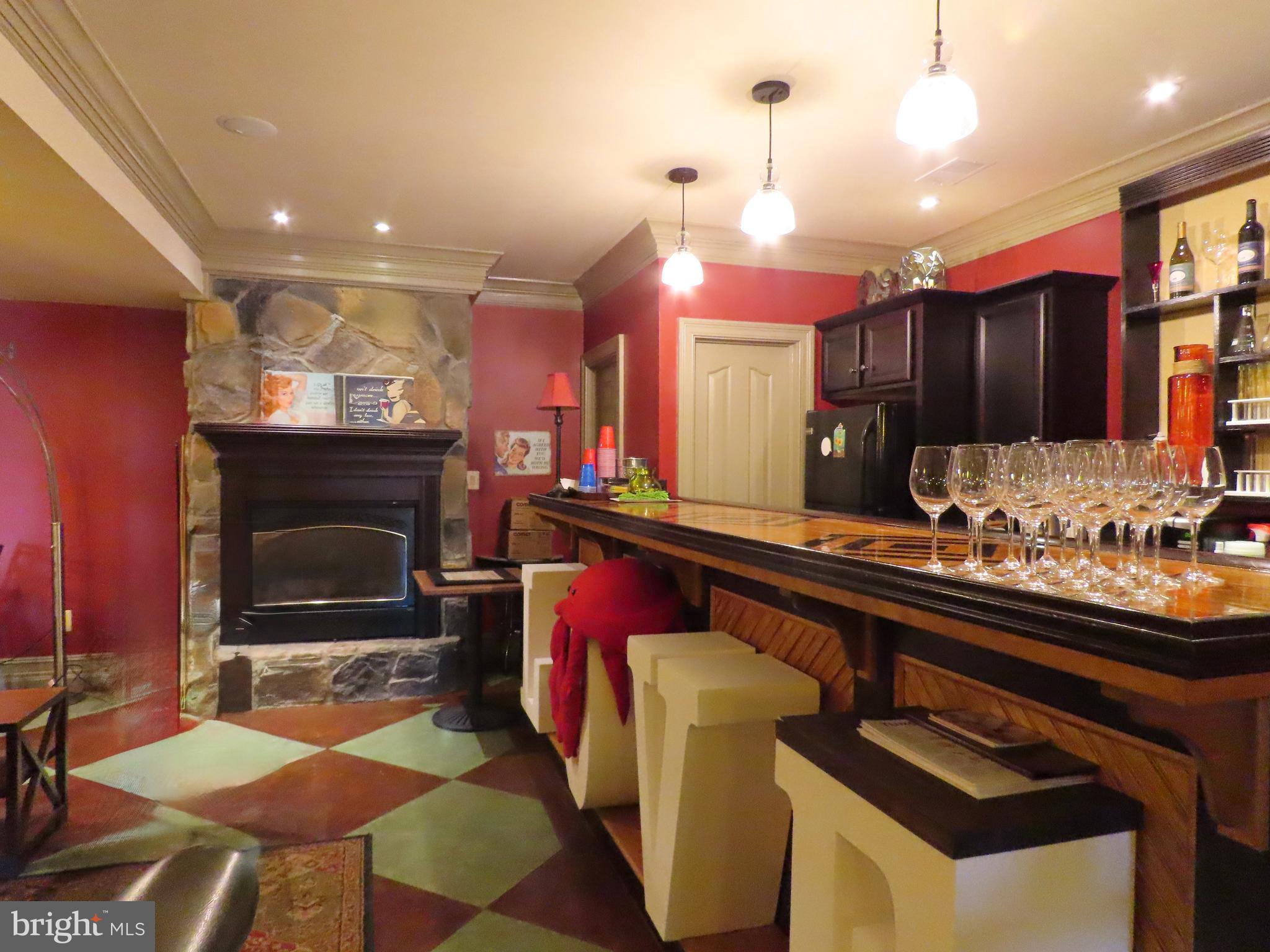 65 Clark Lane Washington, VA 22747 - Photo 44 of 62 a kitchen with a sink and chairs