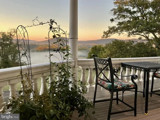 a view of a chairs and table on the terrace