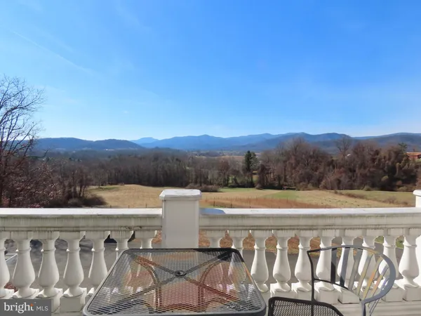 a room with furniture and a window