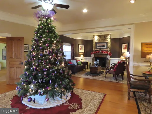 a kitchen with stainless steel appliances kitchen island granite countertop a stove and cabinets