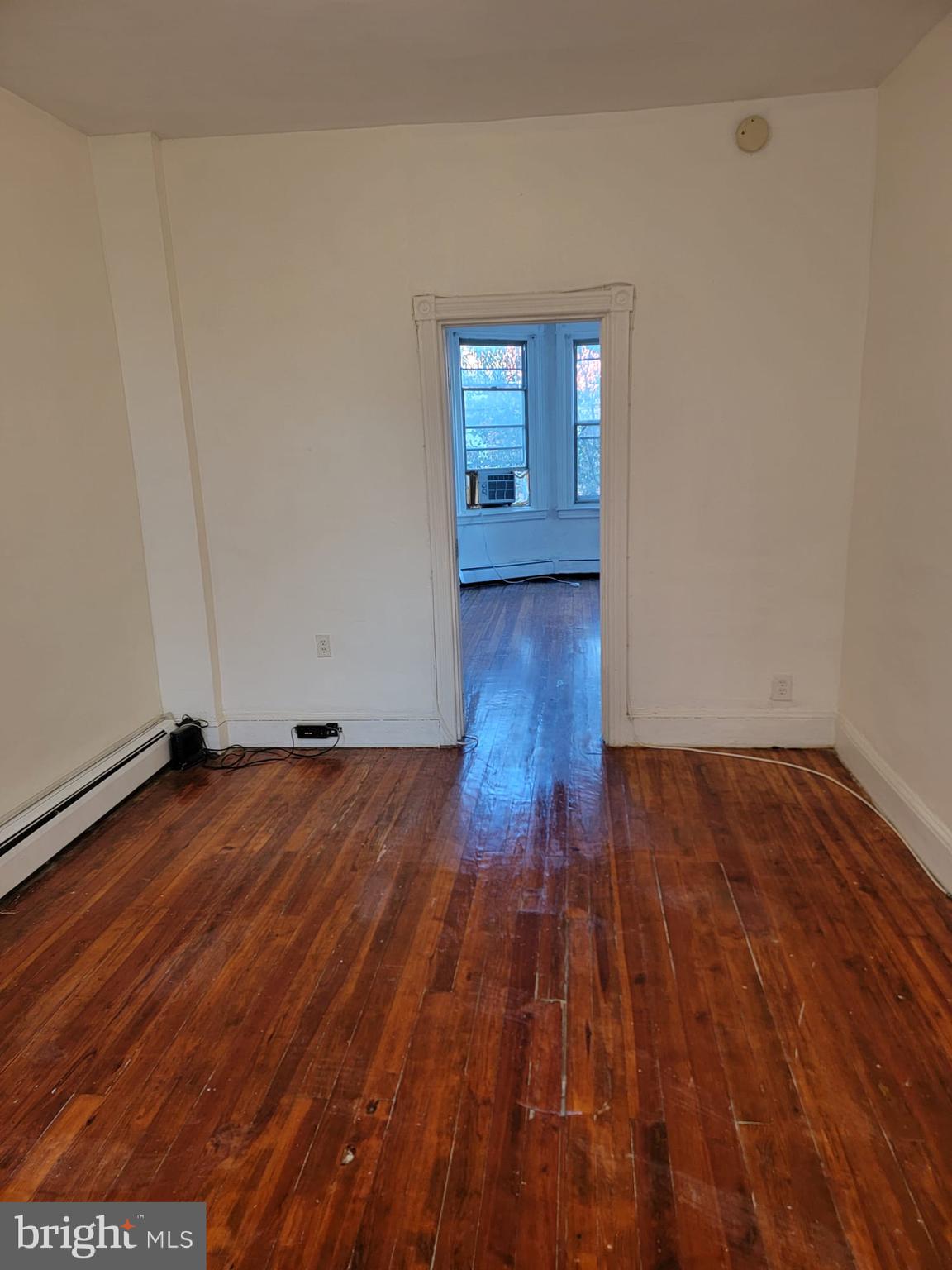 616 Tasker Street, Unit 2 Philadelphia, PA 19148 - Photo 20 of 22 a view of empty room with wooden floor