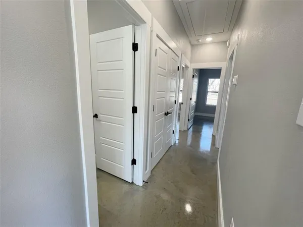 a view of a hallway with closet