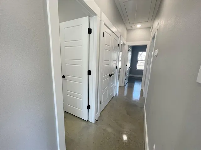 a view of a hallway with closet