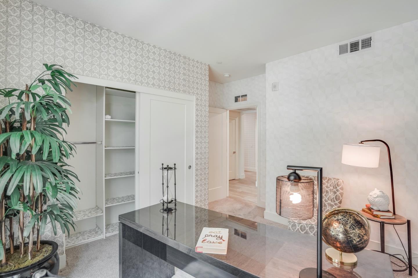 370 Riesling Avenue, Unit 20 Milpitas, CA 95035 - Photo 14 of 36 a living room with furniture and a potted plant