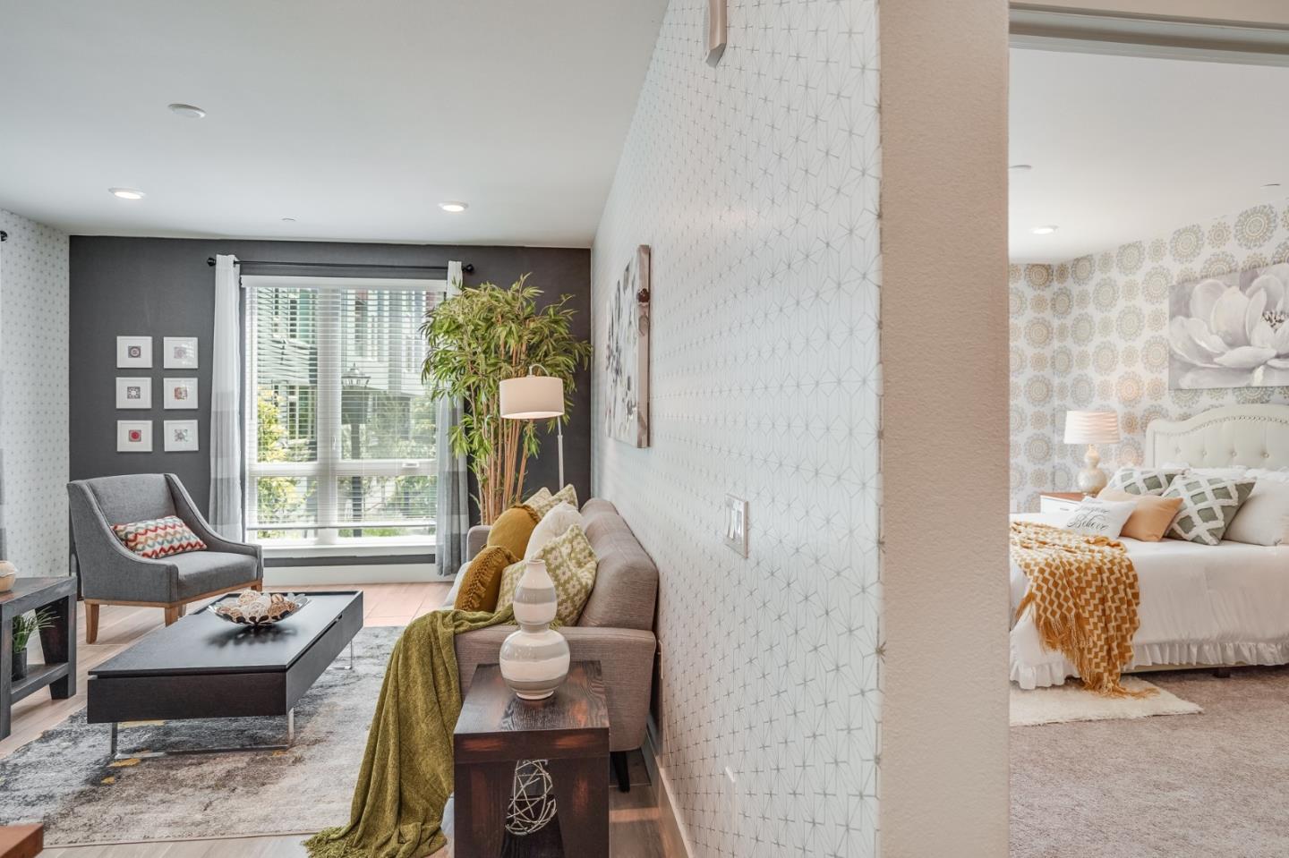 370 Riesling Avenue, Unit 20 Milpitas, CA 95035 - Photo 15 of 36 a living room with furniture and a large window