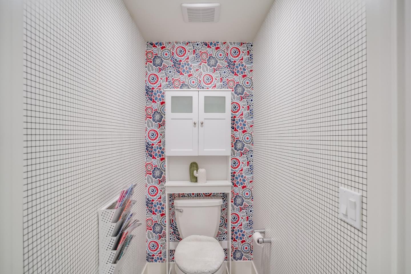 370 Riesling Avenue, Unit 20 Milpitas, CA 95035 - Photo 21 of 36 a bathroom with a toilet and a shower curtain