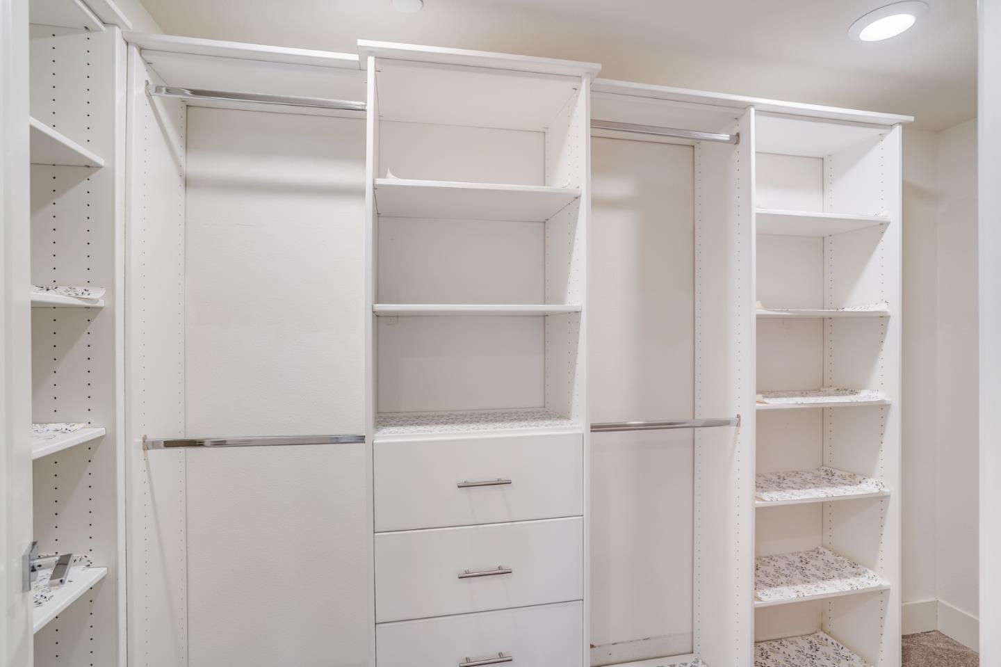 370 Riesling Avenue, Unit 20 Milpitas, CA 95035 - Photo 22 of 36 a view of an empty walk in closet