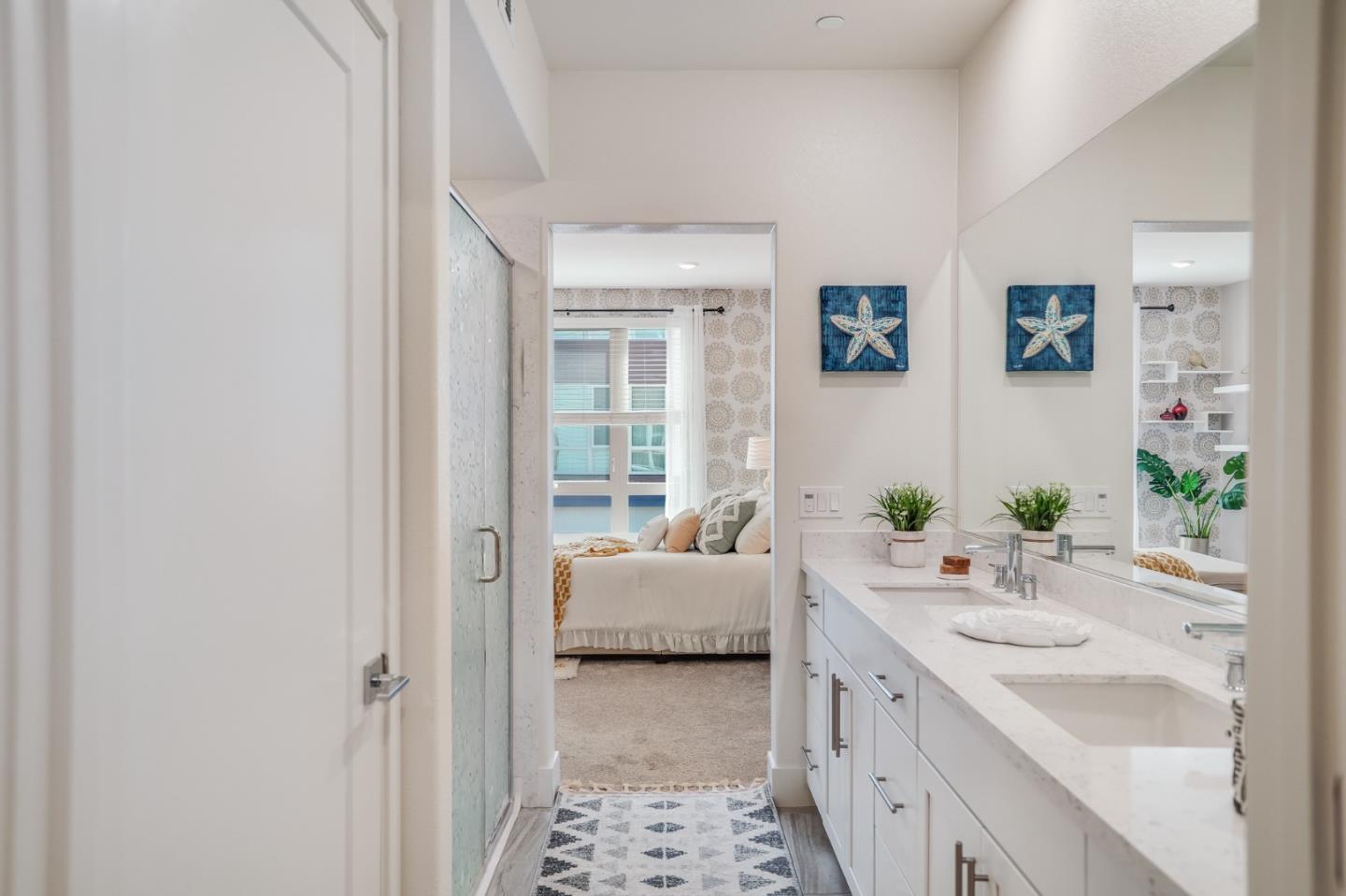 370 Riesling Avenue, Unit 20 Milpitas, CA 95035 - Photo 23 of 36 a en suite bathroom with a sink and a mirror