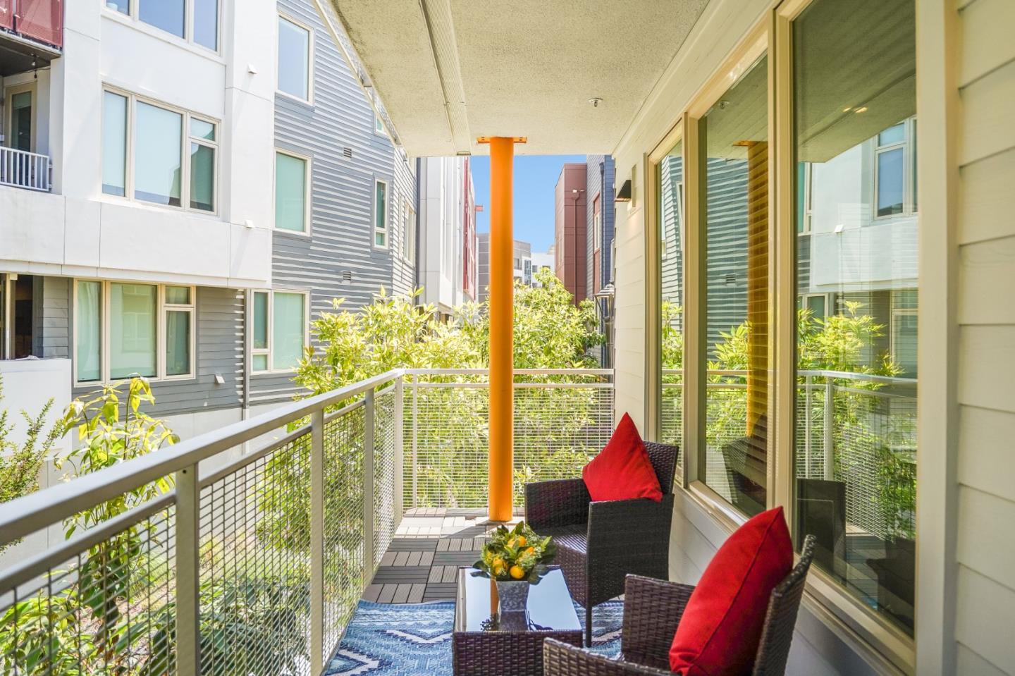 370 Riesling Avenue, Unit 20 Milpitas, CA 95035 - Photo 29 of 36 a view of balcony with furniture and wooden floor