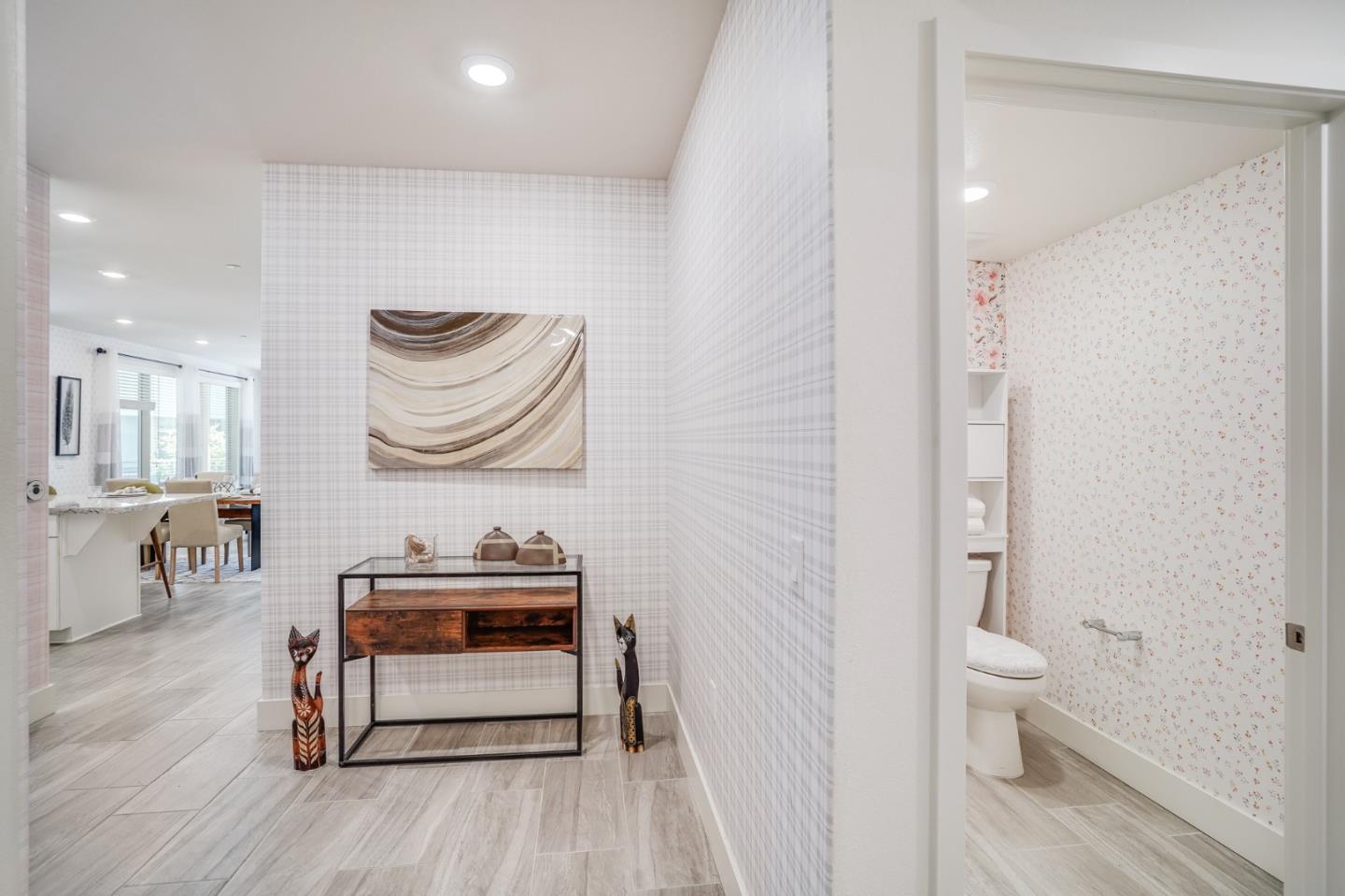 370 Riesling Avenue, Unit 20 Milpitas, CA 95035 - Photo 4 of 36 a bedroom with a bed and a chair