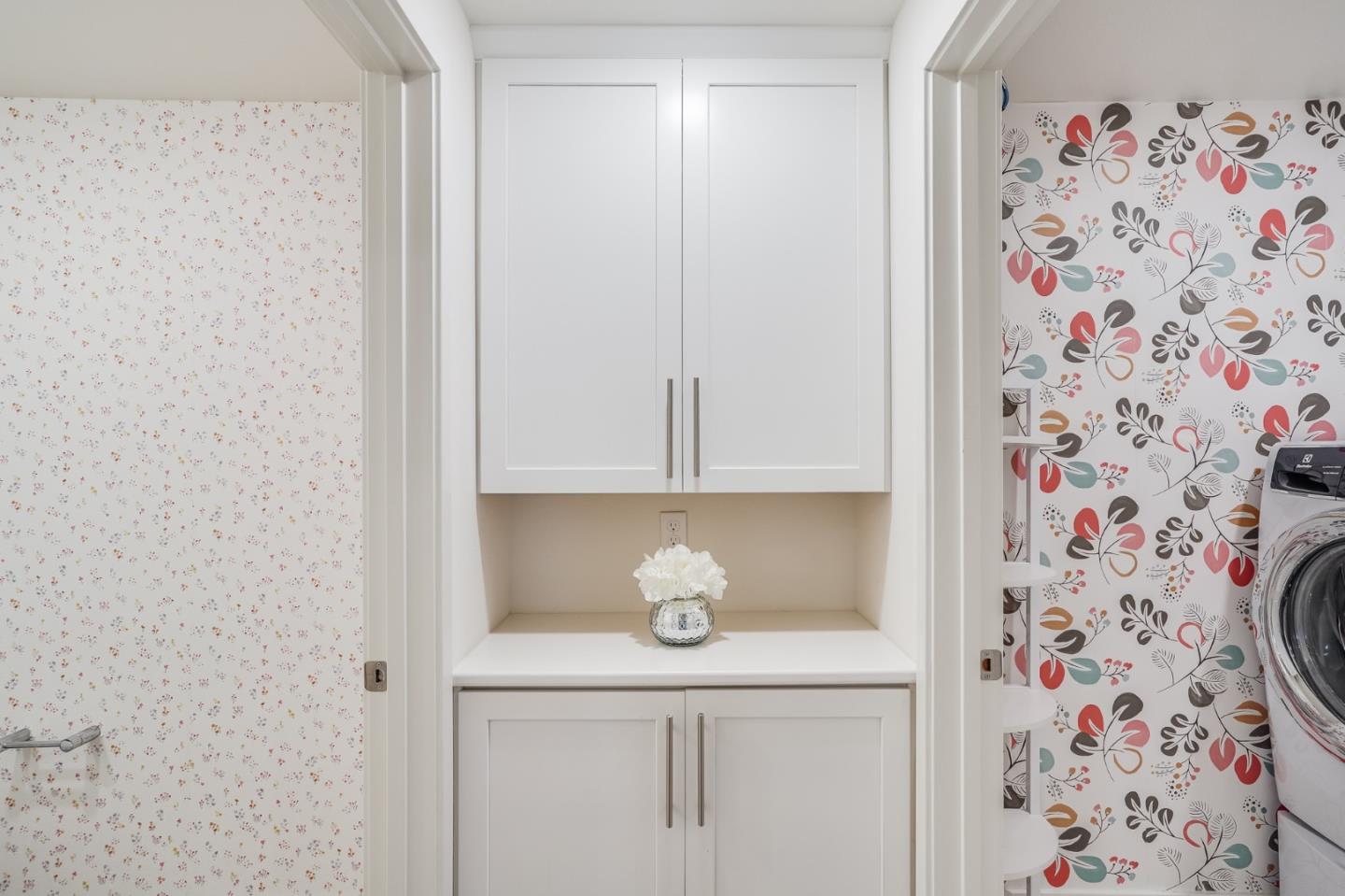 370 Riesling Avenue, Unit 20 Milpitas, CA 95035 - Photo 5 of 36 a bathroom with a shower curtain and a white sink