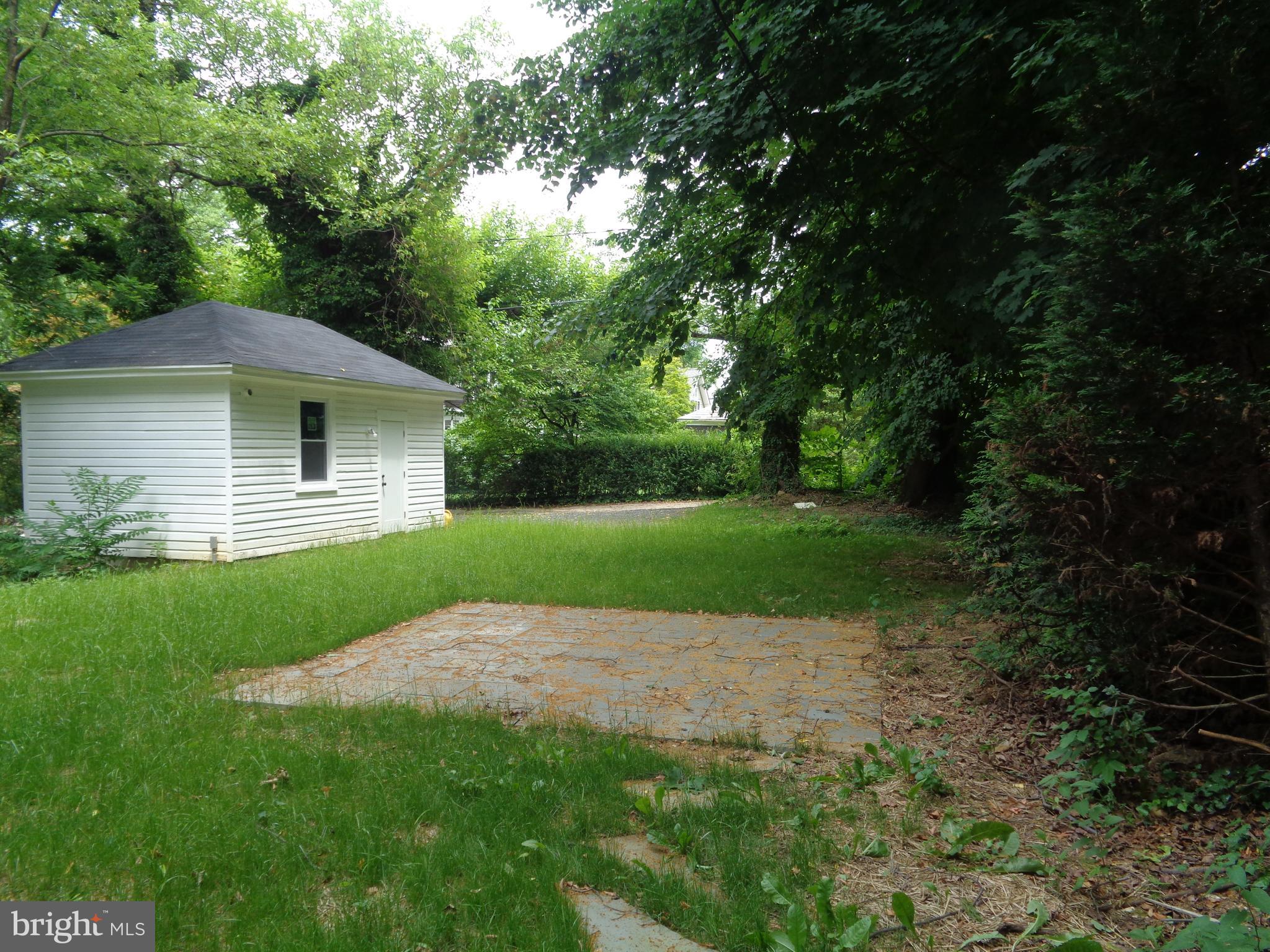 5105 Roland Avenue Baltimore, MD 21210 - Photo 17 of 19 a view of a house with a yard