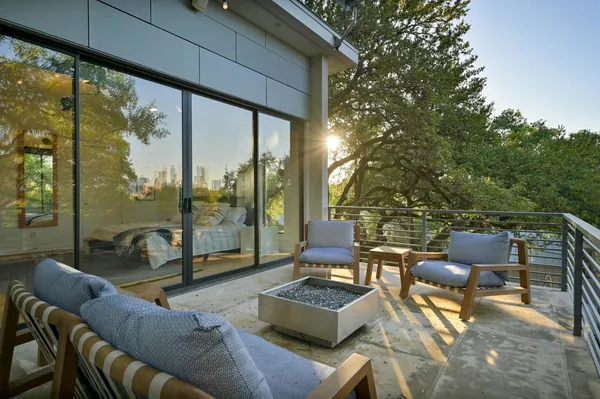 a outdoor living space with patio furniture and a potted plant